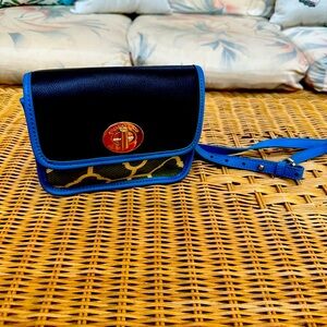 Spartina crossbody with front buckle.